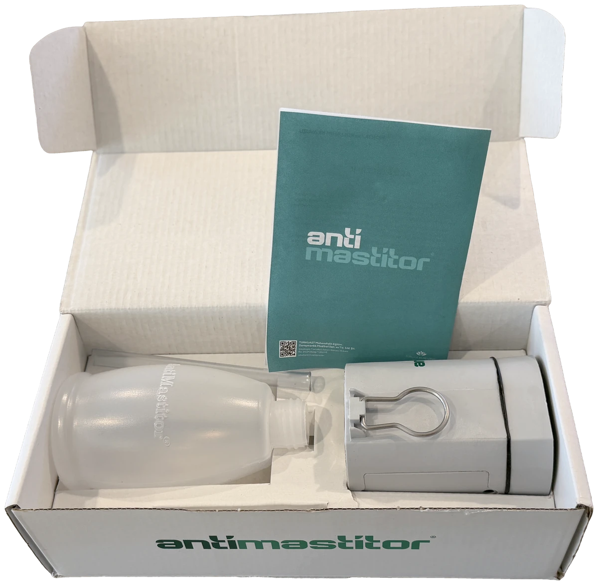Open AntiMastitor branded box with device, conductive medium bottle, and user guide